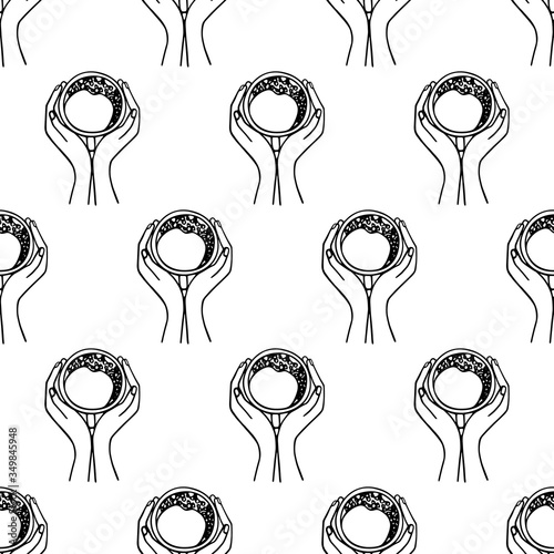 Hands holding a cup of coffee or cocoa hand-drawn. Vector seamless doodle pattern on white background. Design for textile, print.