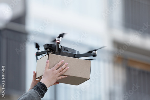 New drone with package box, delivery service modern electronic device photo