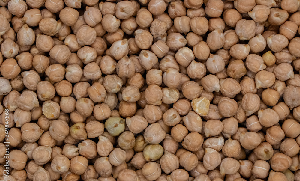Tight close up background made by chickpeas Tight close up background made by chickpeas