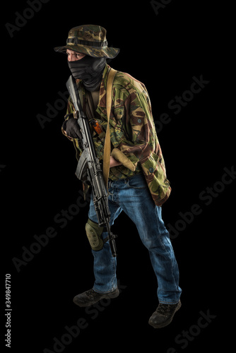 post-apocalyptic soldier. style of dress from 90's. shot in studio. isolated with clipping path on black background
