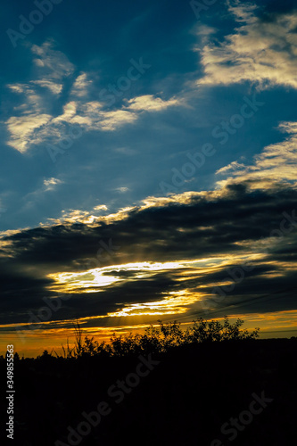 mozaika złota i błękitu zachodzącego słońca  © Grzegorz