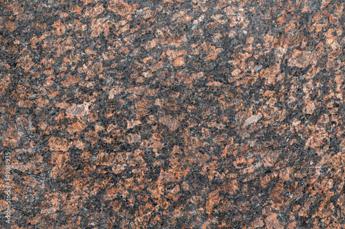 The stone is granite. Granite texture. Background image. © Анастасия Алексеева