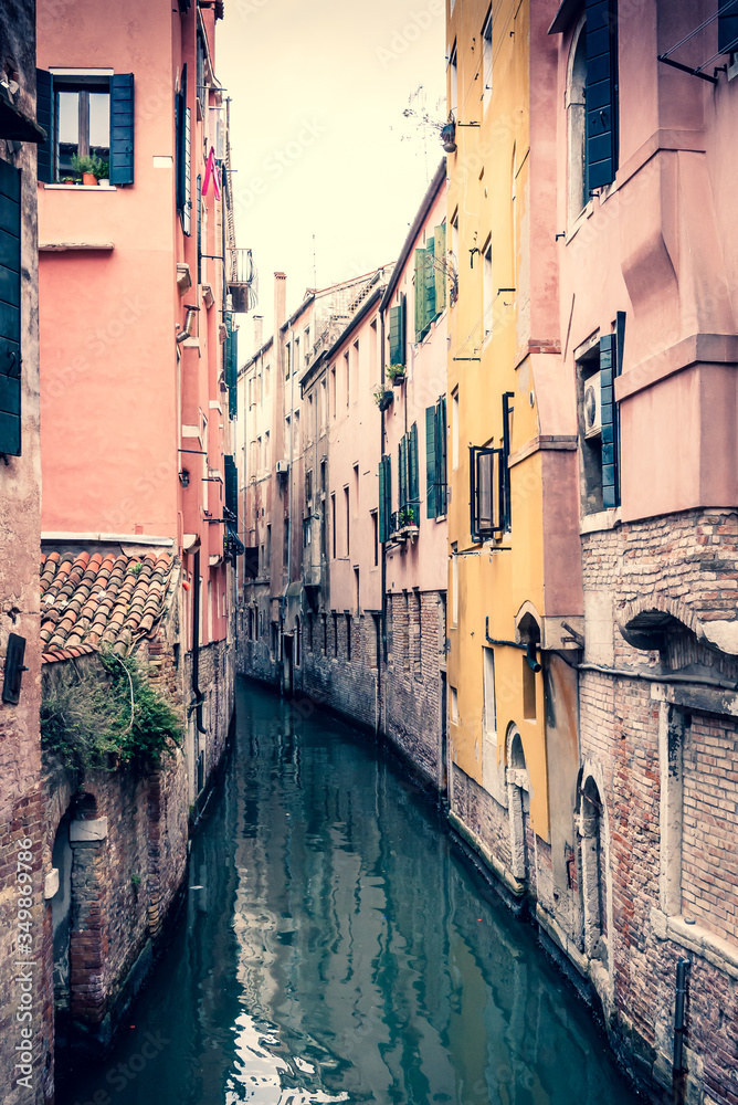 Venice canal and architecture scene with reflections