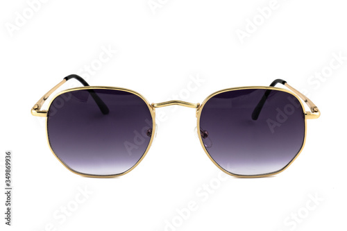 Sunglasses with dark blue color gradient lens and rectangle shaped gold thin metal frame, isolated on white background, front view.