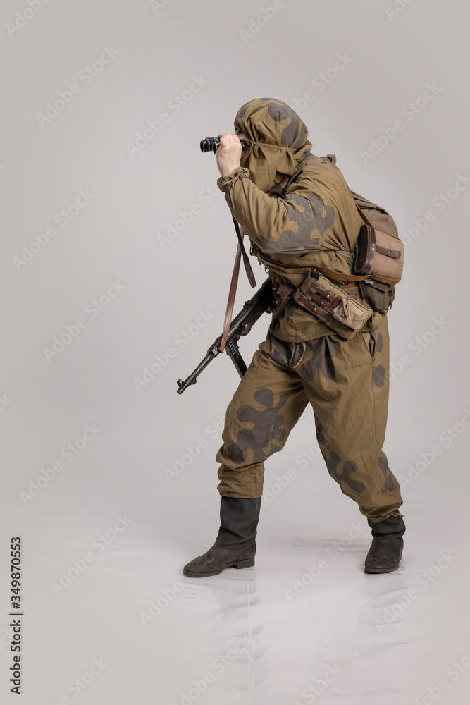 unrelated pin tight Actor man in an old military uniform and camouflage clothing of a soldier  of the Soviet army during the World War II Stock Photo | Adobe Stock