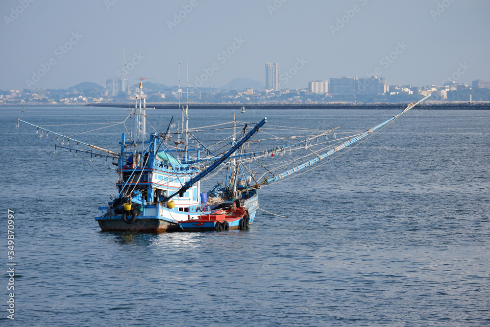 Small fishing in the middle of the sea