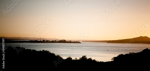 Auckland bay and cityscape from Waiheke Island, dusk. New Zealand