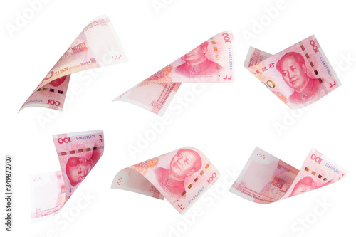 Isolated of 100 China renminbi Yuan banknote currency flying collection on white background. China have high economic growth and Yuan currency is the main exchanging.