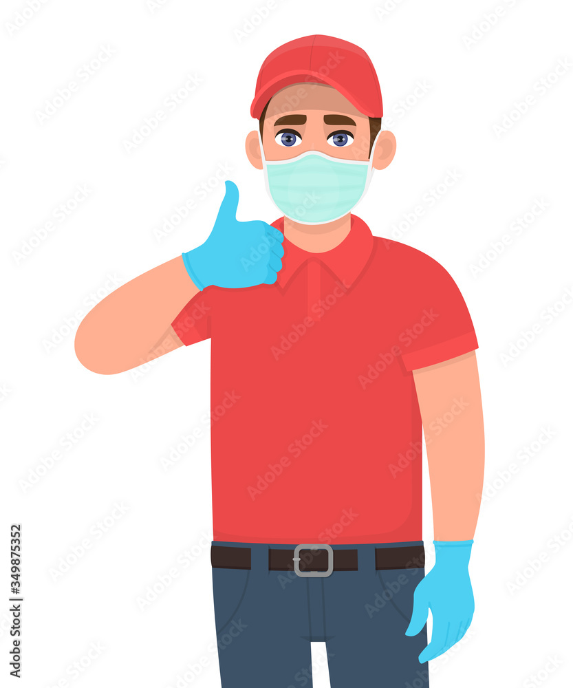 Courier or deliveryman in mask and gloves showing thumbs up sign. Person gesturing like or good. Man making agree, positive symbol. Corona virus outbreak. Door delivery service during quarantine. Courier or deliveryman in mask and gloves showing thumbs up sign. Person gesturing like or good. Man making agree, positive symbol. Corona virus outbreak. Door delivery service during quarantine.