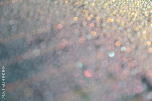 Blurred water droplets on the windscreen. Blurred water droplets on the glass.