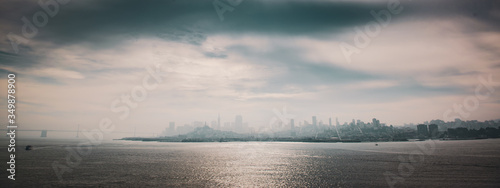 San Francisco skyline through the haze on a sunny day