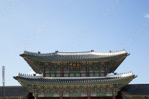 It is a historic building in Korea. The meaning of the written article is Geunjeongmun. This door goes through before going to Geunjeongjeon.