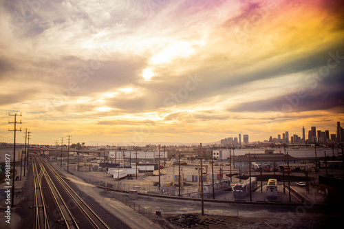 Railway tracks next to a railway yard during beautiful sunset  © Daniel
