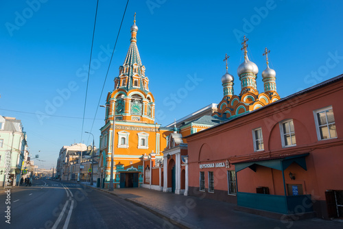MOSCOW, STREET GREAT POLYANKA 29A, RUSSIA - FEBRUARY 22, 2020: Church of St. Gregory of Neocaesarea in Darbitz. Bright red green sanctuary in the city center. Old historical building built in 1668