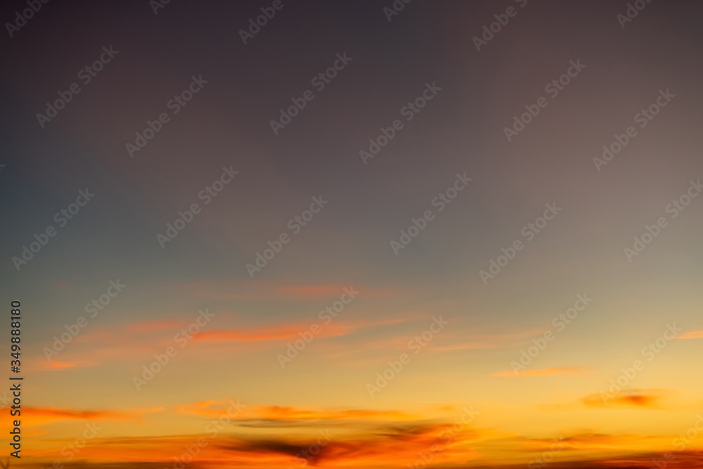 Fototapeta premium Sky gradient from blue to orange sunset