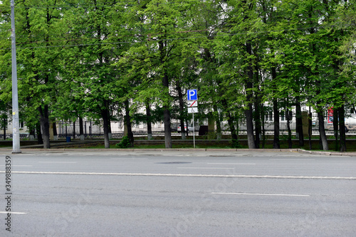 "Chelyabinsk, Chelyabinsk region / Russia-17. 05. 2020: Vorovsky street, roadway and adjacent buildings and bus stop".