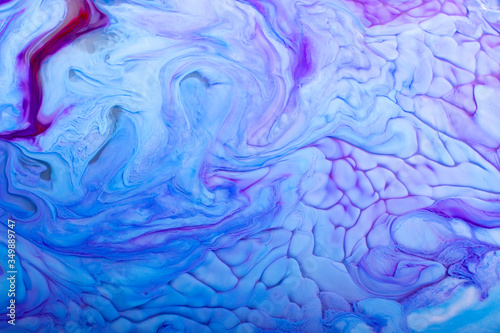 Mystical blue and purple paint background. Pronounced texture. 