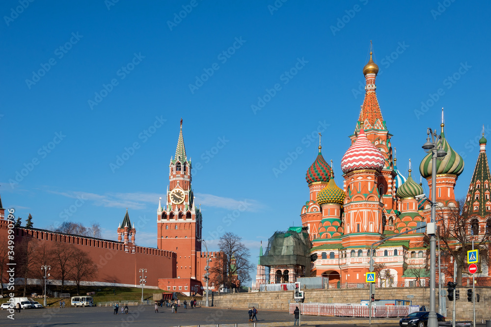 MOSCOW, RUSSIA - FEBRUARY 22, 2020: View of St. Basil's Cathedral, Spasskaya tower of the KREMLIN and Vasilyevsky Descent  from Zaryadye Park