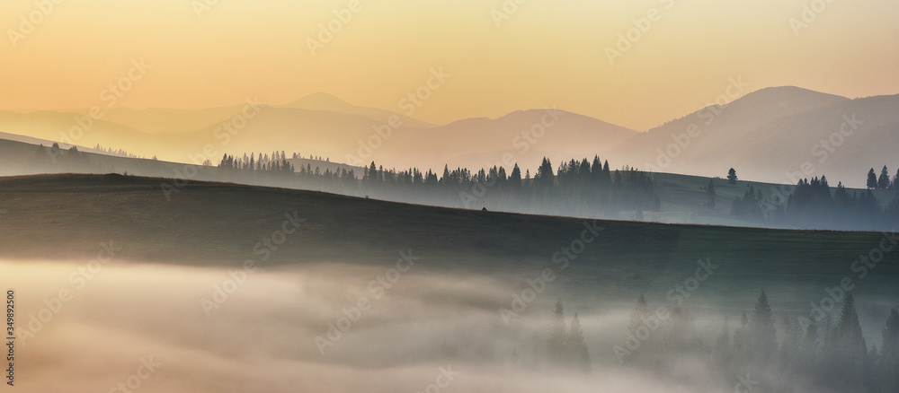 silhouettes of mountains. foggy autumn morning. Morning Carpathians silhouettes of mountains. foggy autumn morning. Morning Carpathians