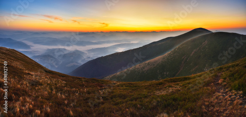 silhouettes of mountains. foggy autumn morning. Morning Carpathians