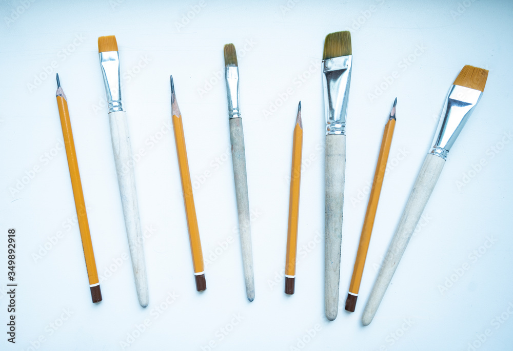 a set of brushes for drawing different sizes and pencils of different hardness slates for creating pictures a set of brushes for drawing different sizes and pencils of different hardness slates for creating pictures