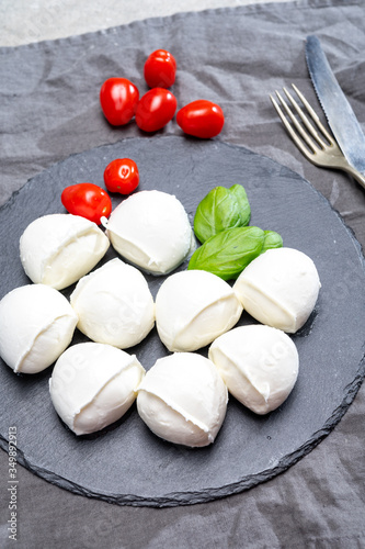 Tasty italian food, fresh white buffalo mozzarella soft cheese balls from Campania