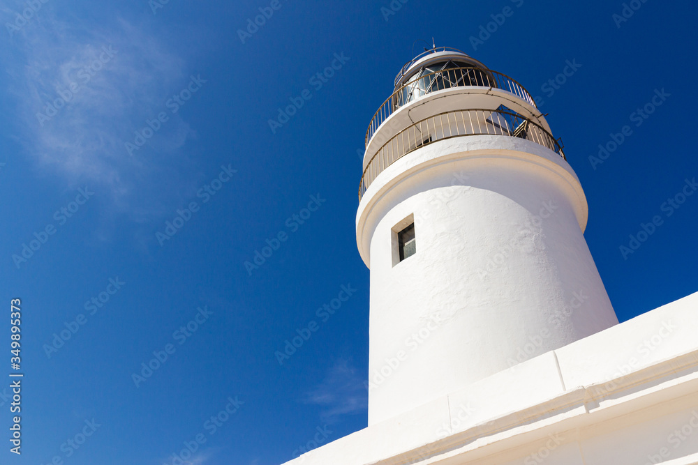 views of the beautiful lighthouse of cavalleria from a low angle on the island of menorca (balearic islands, spain)