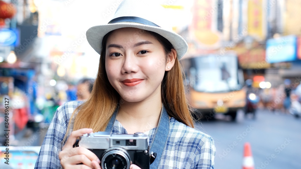 Traveler Asian blogger women travel in Bangkok, Thailand, beautiful female using mobile phone make vlog and live in social media .woman tourist making video call with smartphone.