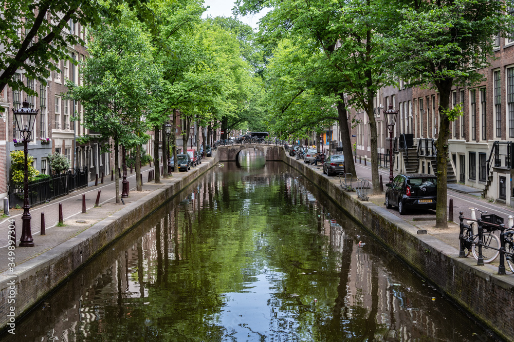 Amsterdam, Netherlands - May 2018: Classic Amsterdam canal scene