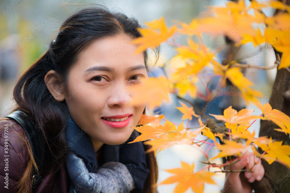 Asian woman and red maple in autumn of Nikko, Japan Asian woman and red maple in autumn of Nikko, Japan