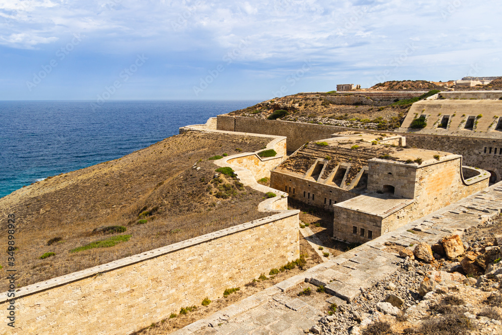 Panoramic views of the fortress of La Mola in Menorca. With surroundings and sea in the background.(balearic islands, spain)