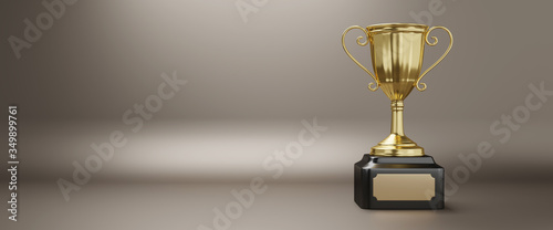 Golden trophy award on white background. Gold winners trophy with copy space for text. 3d rendering.