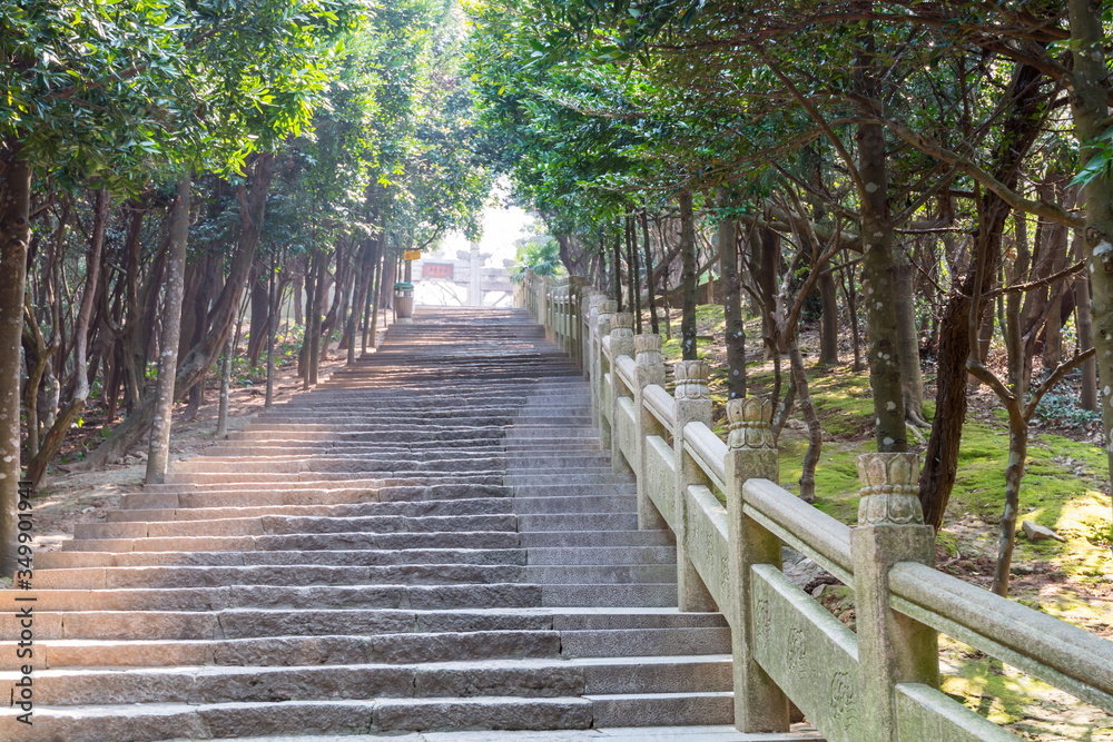 Stone staircases to the gateway of Mount Luojia, which lies in the Lotus Sea to the southeast of Putuo Mountain, Zhoushan, Zhejiang, the place where Bodhisattva Guanyin practiced Buddhism Stone staircases to the gateway of Mount Luojia, which lies in the Lotus Sea to the southeast of Putuo Mountain, Zhoushan, Zhejiang, the place where Bodhisattva Guanyin practiced Buddhism