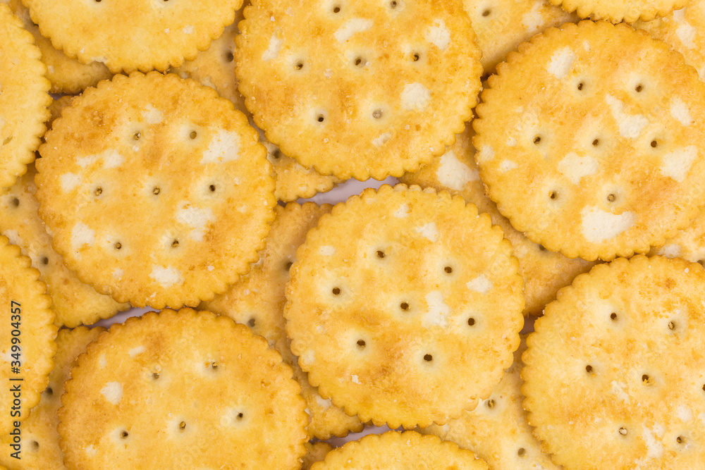 background of round crunchy cracker with salt background of round crunchy cracker with salt