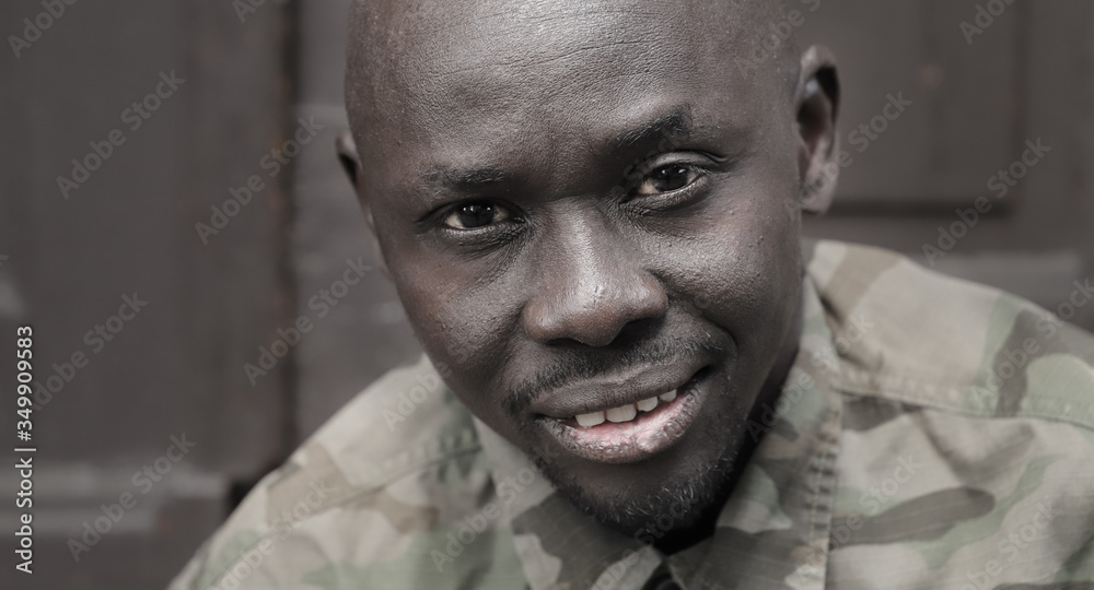 Soldier Portrait Face, Black African Man wearing camouflage uniform