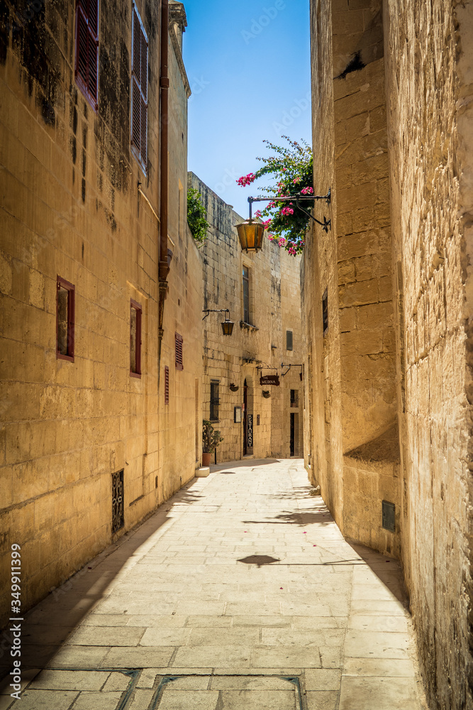 Streets of Mdina Malta Golden hour of a fabulous city with strong heritage and atmosphere of fantasy ethernal town