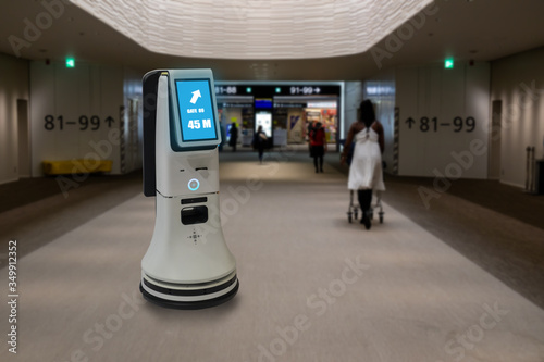 smart hotel in hospitality industry 4.0  concept, the receptionist robot (robot assistant ) in lobby of hotel or airports always welcome customer the service is  including room, information provision