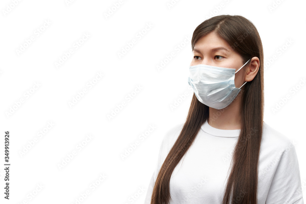 Asian young woman in medical mask portreit on white background isolated Asian young woman in medical mask portreit on white background isolated