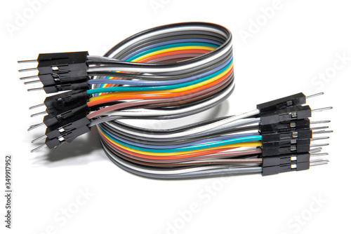 Colorful rainbow wire connectors isolated on white background