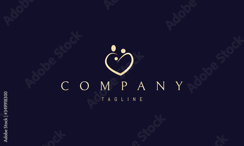 Vector golden logo on which an abstract image of the heart, in the form of hugging husband and wife with a baby in her arms.