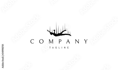 Vector logo on which an abstract image of a man flying without a parachute.