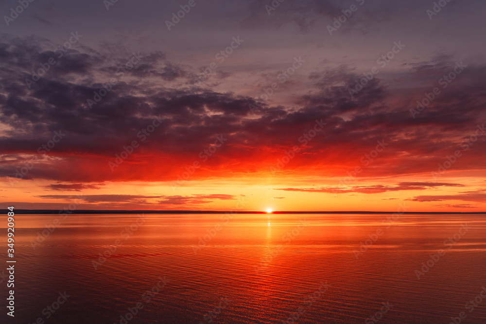 Beautiful view of the sea and sunset. Beautiful nature landscape with dramatic clouds sunset sky and views of the sea surface. Postcard view. Nature. Concept. Golden sunset