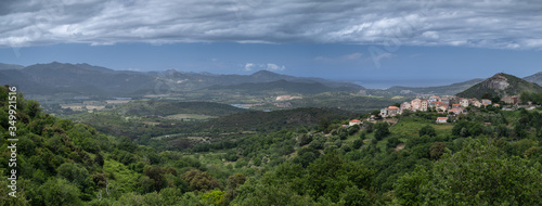 Corsican landscape of hills and the village of Oletta