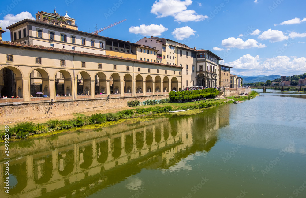 View of Arno River and Vasari Corridor or Corridoio Vasariano in Florence, Tuscany, Italy