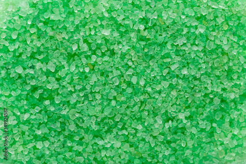 green salt crystals. Natural beauty product concept. textured surface. top view, close-up.