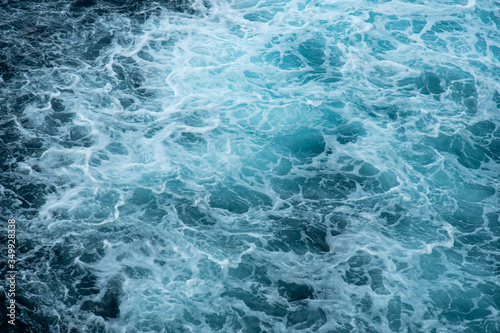The raging waters of the raging ocean. A cap of sea foam in a whirlpool.Abstract. Background. © DOF