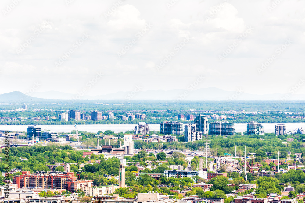 Cityscape or skyline aerial view of downtown Montreal city, Canada from Mont Royal