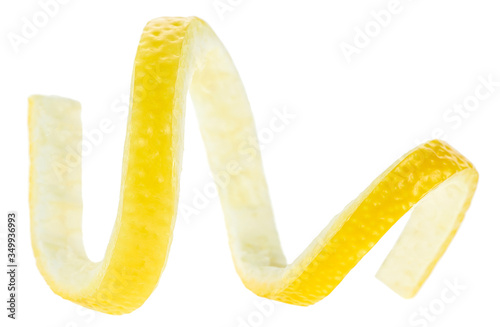 Lemon peel curl isolated on a white background. Lemon twist. Citrus twist peel.