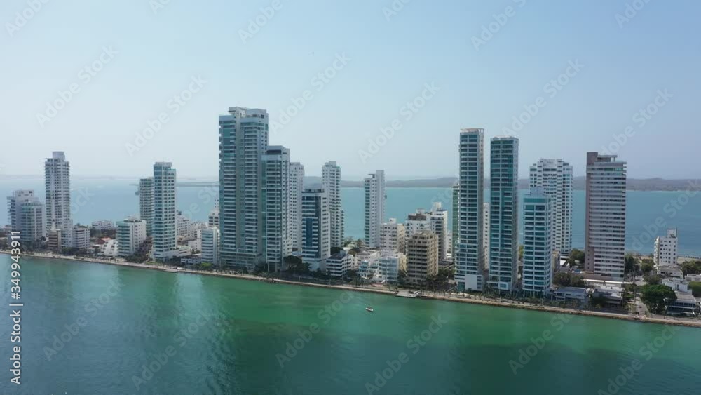 Aerial view of business apartments near the sea in Cartagena. Traffic along the coast Aerial view of business apartments near the sea in Cartagena. Traffic along the coast