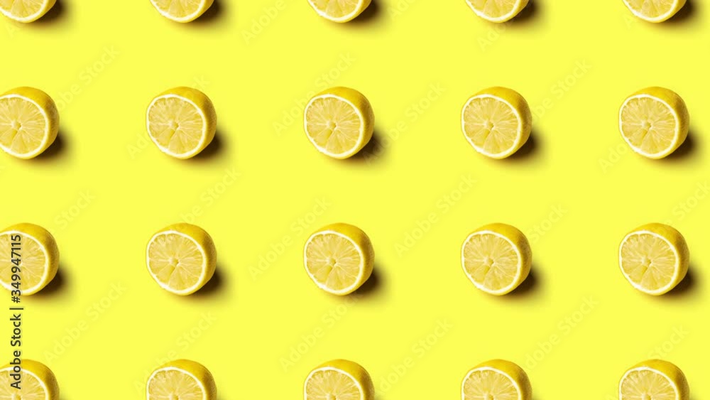Animation of lemons pattern on yellow background, 4K seamless loop Animation of lemons pattern on yellow background, 4K seamless loop